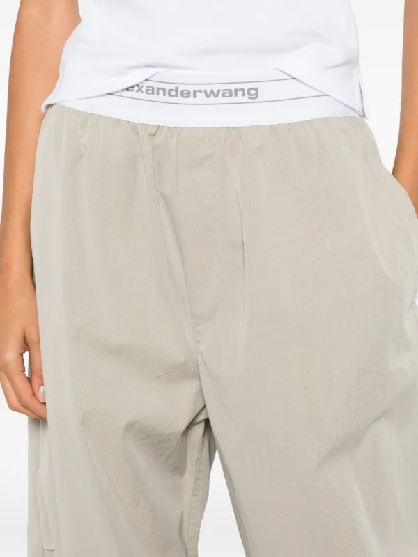 Alexander Wang logo-waistband Pleated Trousers | Green | FARFETCH