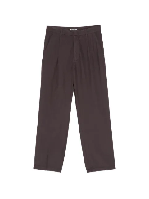 Auralee garment-dyed pleated trousers