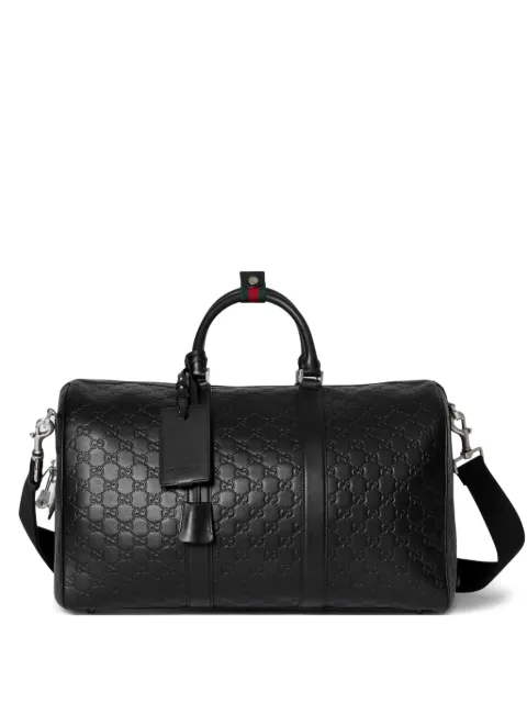 Gucci embossed duffle bag