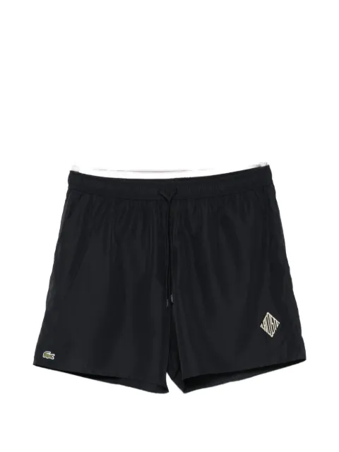 Lacoste logo-patch swim shorts