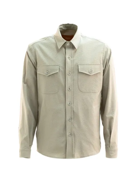 Cruna camisa con bolsillo con botones