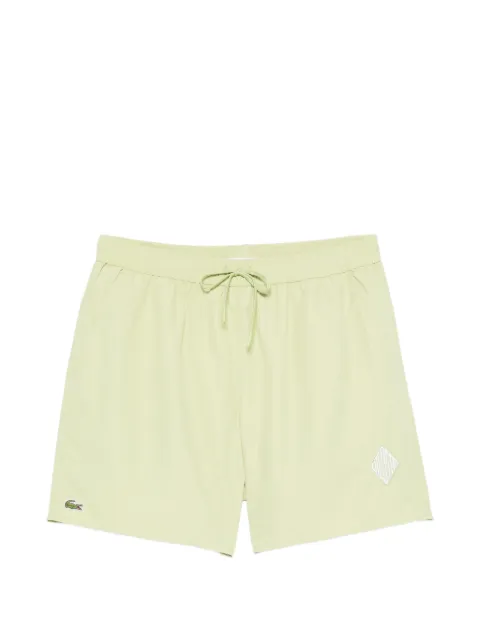 Lacoste drawstring geometric swim shorts