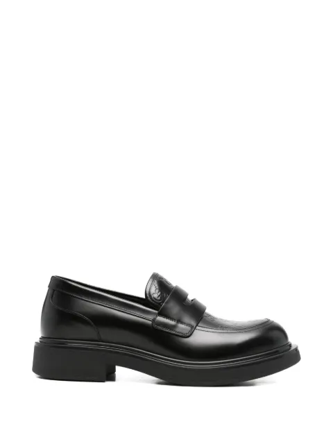 Gucci monogram-debossed loafers