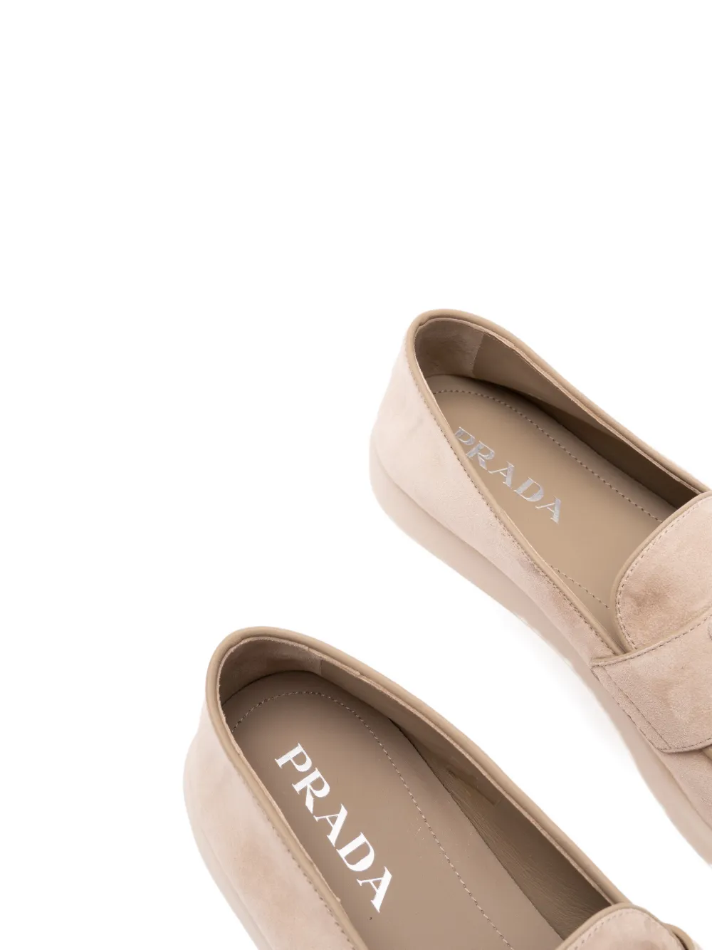 Prada Loafers met logoplakkaat Beige