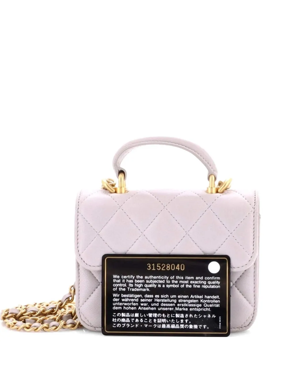 CHANEL Pre-Owned Portamonete con manico in pelle di agnello Caviar trapuntata - Grigio