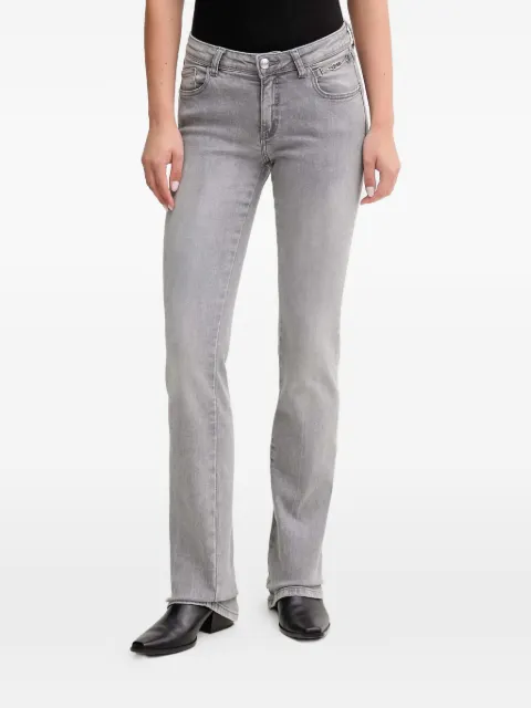 Gaudi jeans con trabillas