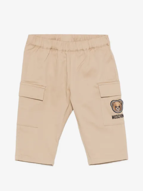 Moschino Kids pantalones con bolsillos y solapa