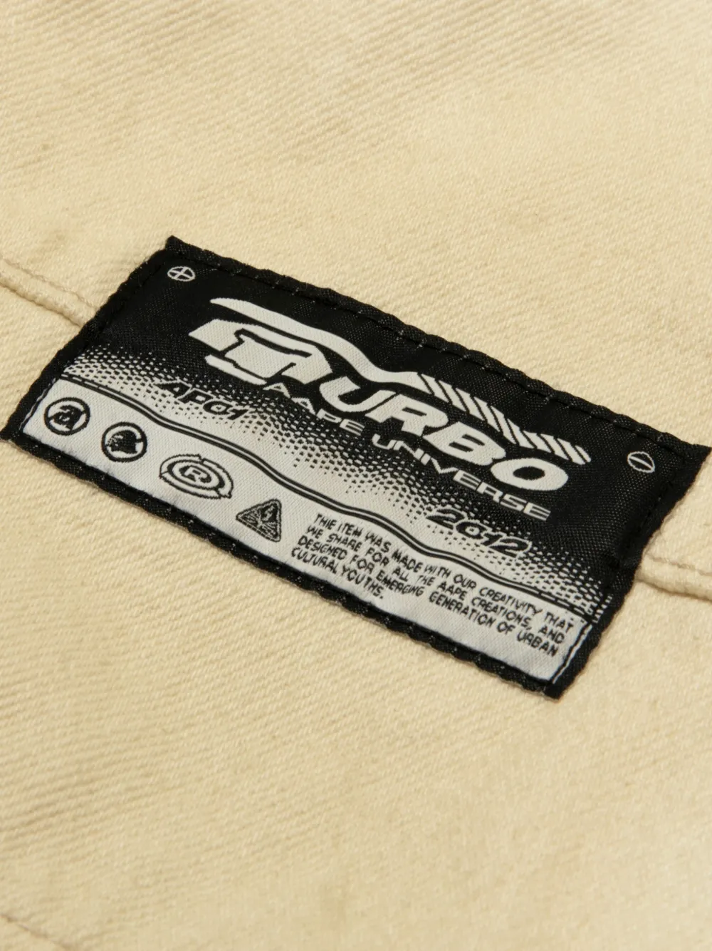 AAPE BY *A BATHING APE Broek met logo Beige