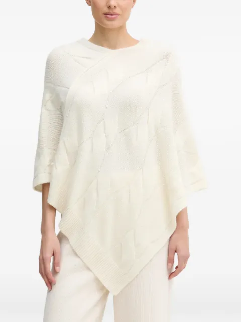 Benetton poncho en tejido de ochos