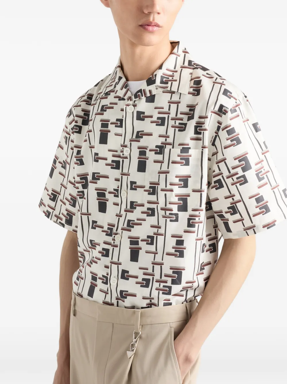 Prada T-shirt van katoenblend met print Beige
