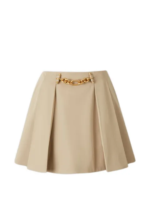 Balmain falda corta con diseño plisado y cadena