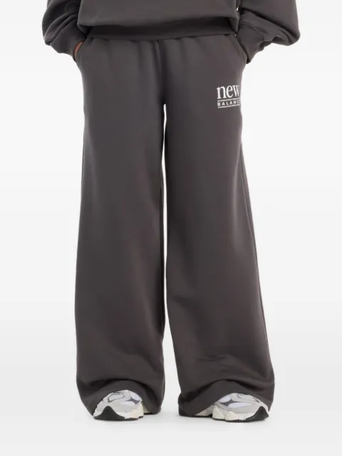 New Balance pantalones de tela polar con cordones
