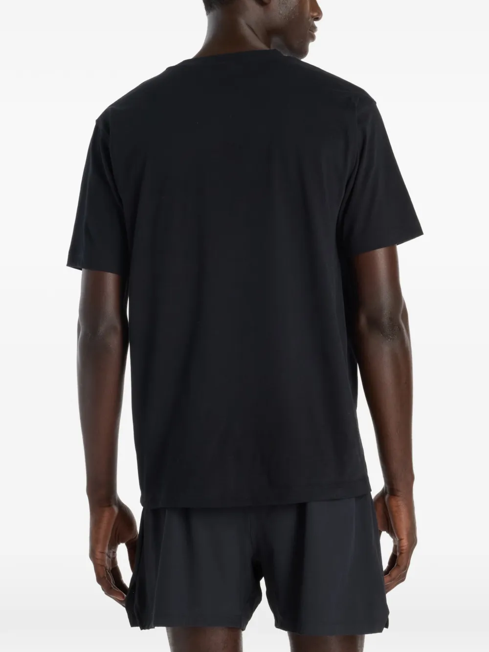 New Balance Vortex T-shirt met grafische print Zwart