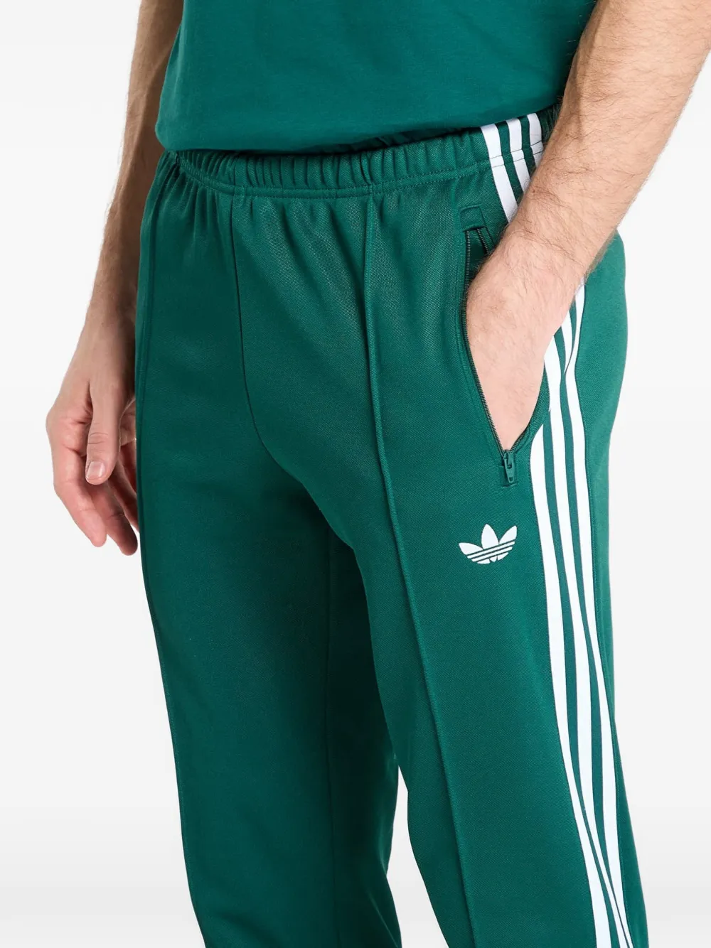 adidas Beckenbauer trainingsbroek met streepdetail Groen