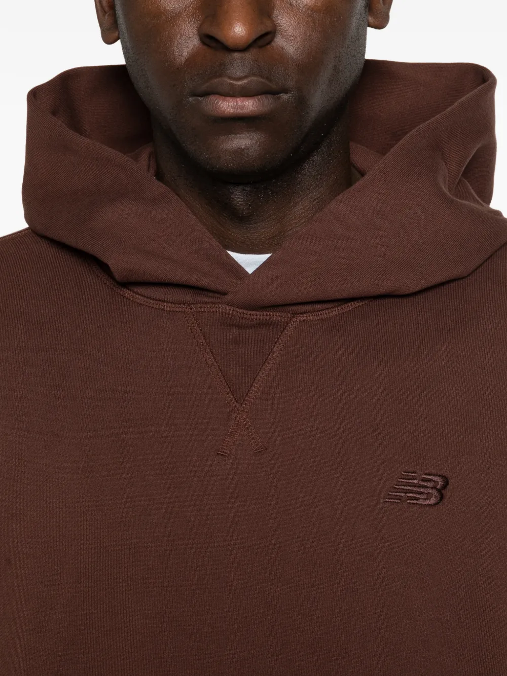 New Balance Sweater met capuchon en zak Bruin