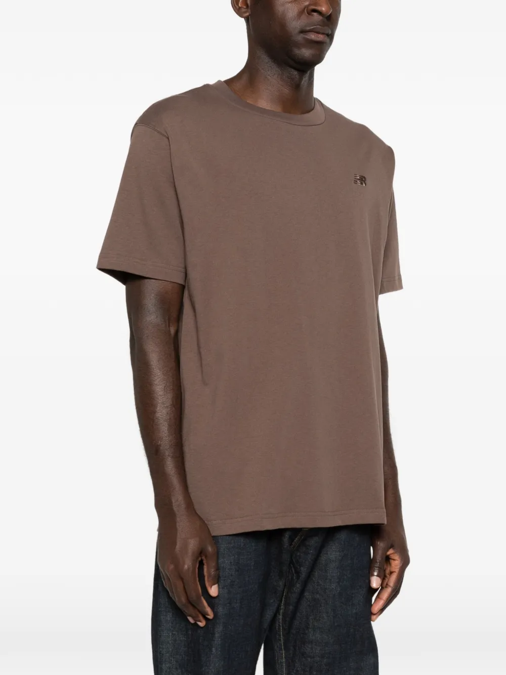 New Balance T-shirt met logodetail Bruin