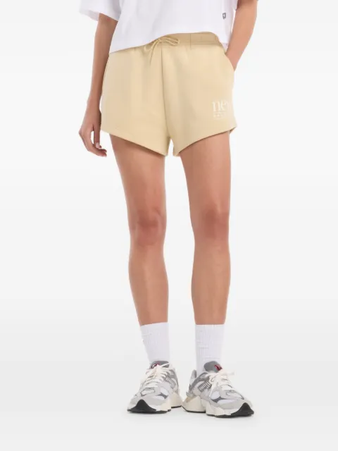 New Balance bermudas de tela polar con cordones en la pretina