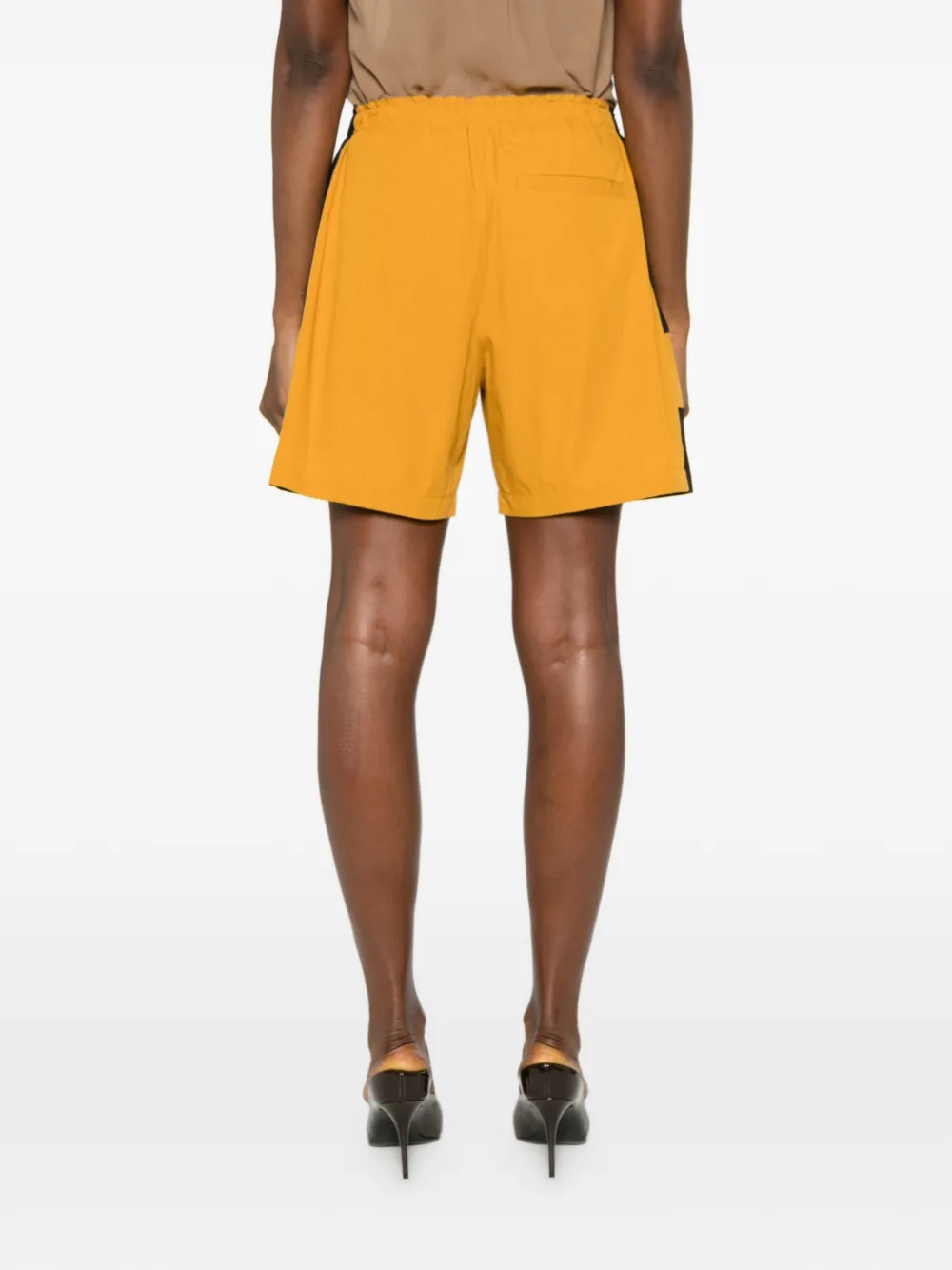 Saint Laurent Cassandre shorts met logo Geel