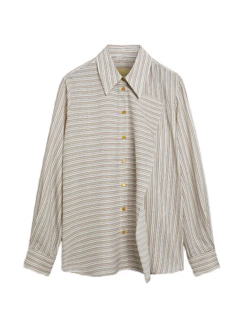 Momoni Lopez in striped shirt