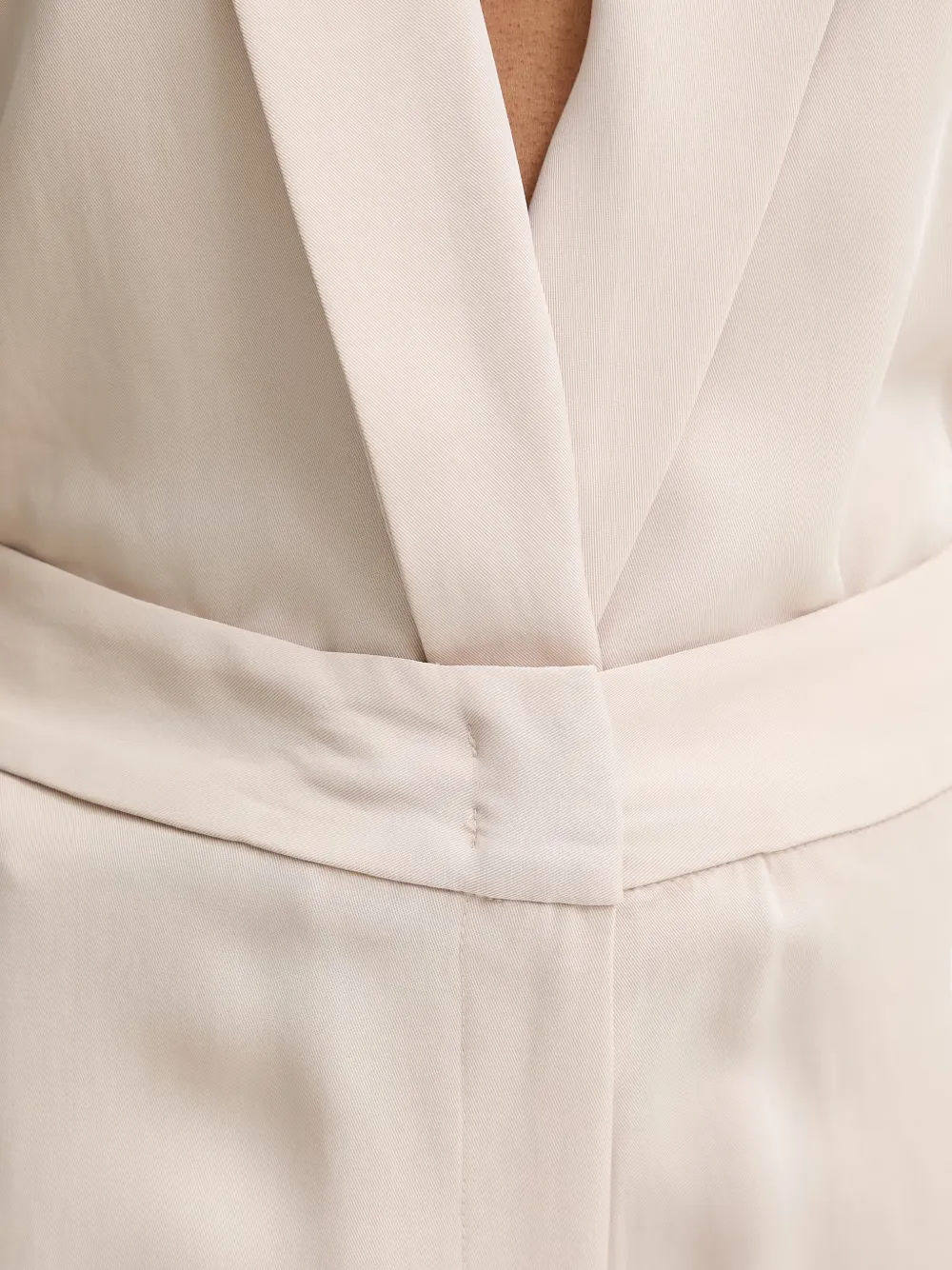 SIMONA CORSELLINI Jumpsuit met V-hals Beige