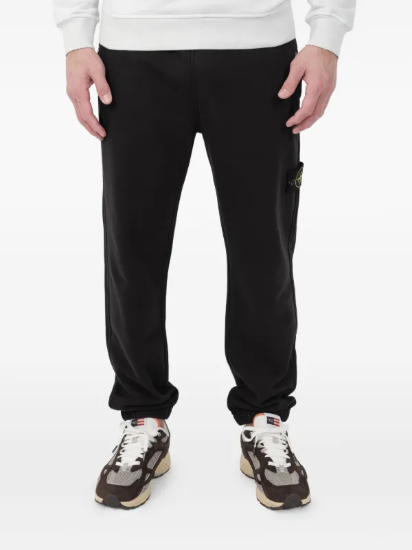 パンツ STONE  Stone Island トラックパンツ | ブラック | FARFETCH JP