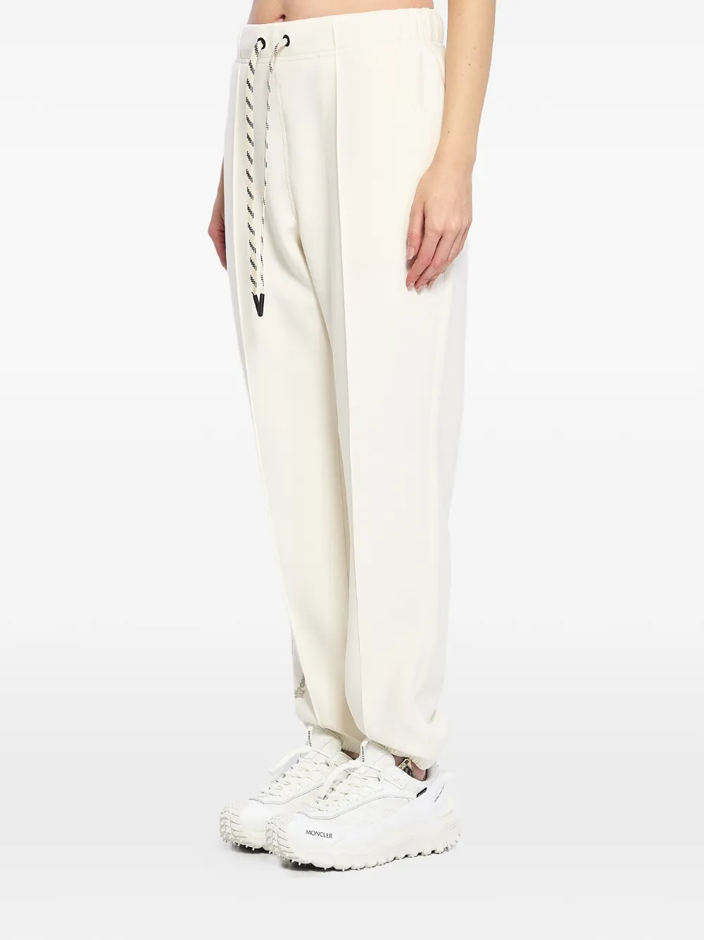 Moncler Grenoble Elastische sportbroek met plooien Beige