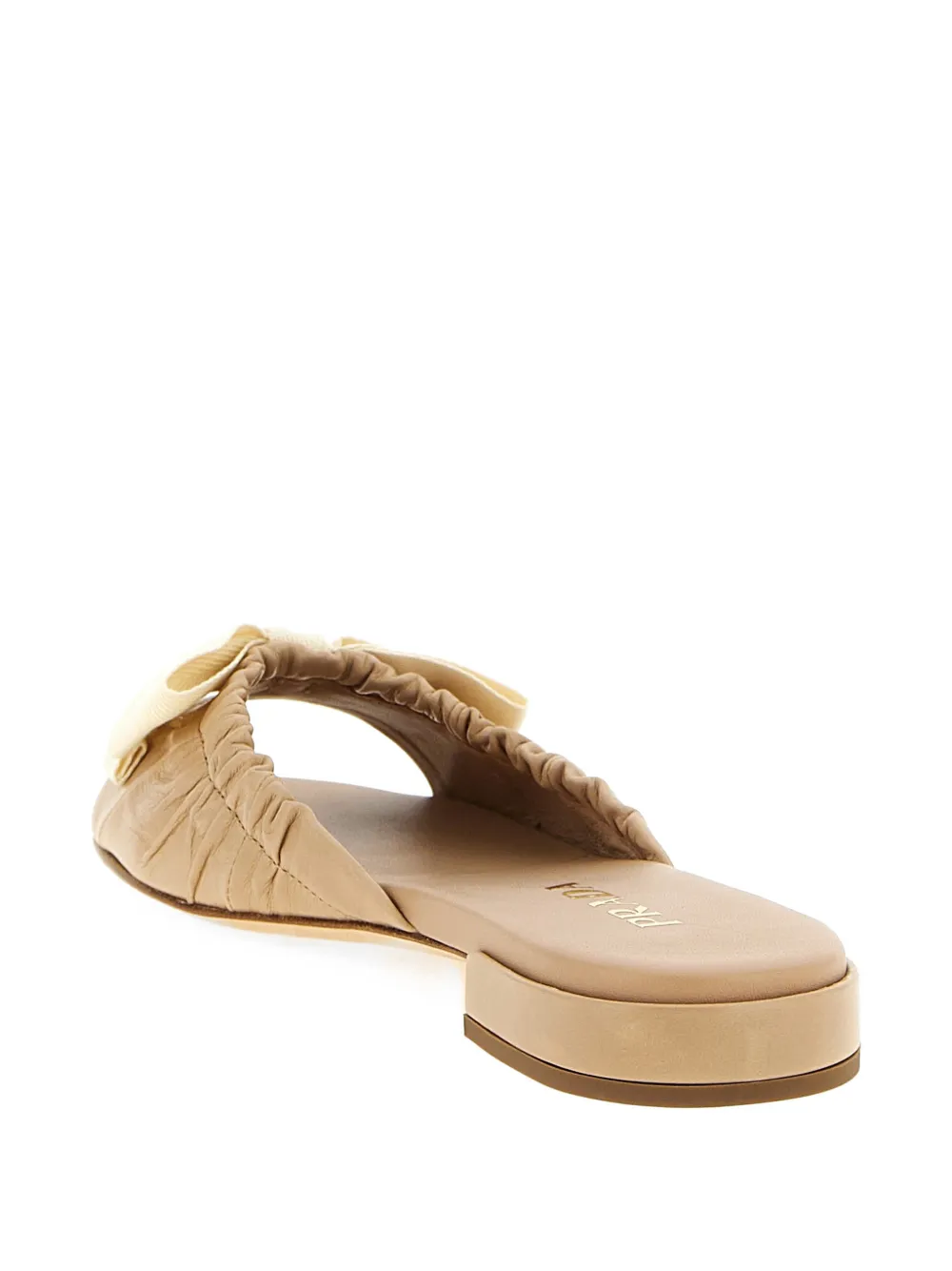 Prada Leren slippers met strikdetail Beige
