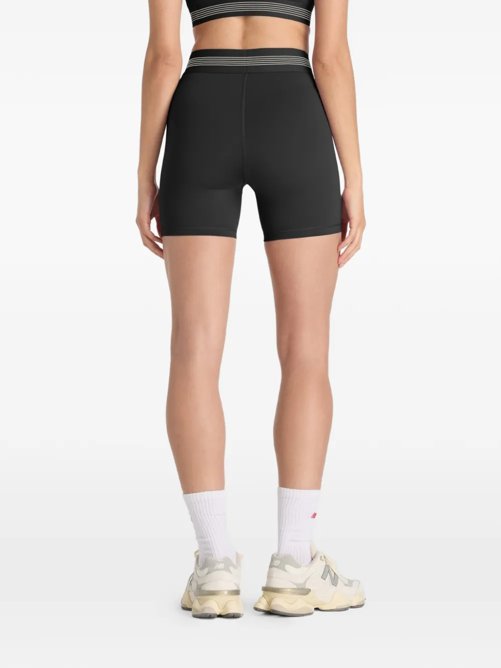 New Balance AC getailleerde shorts Zwart