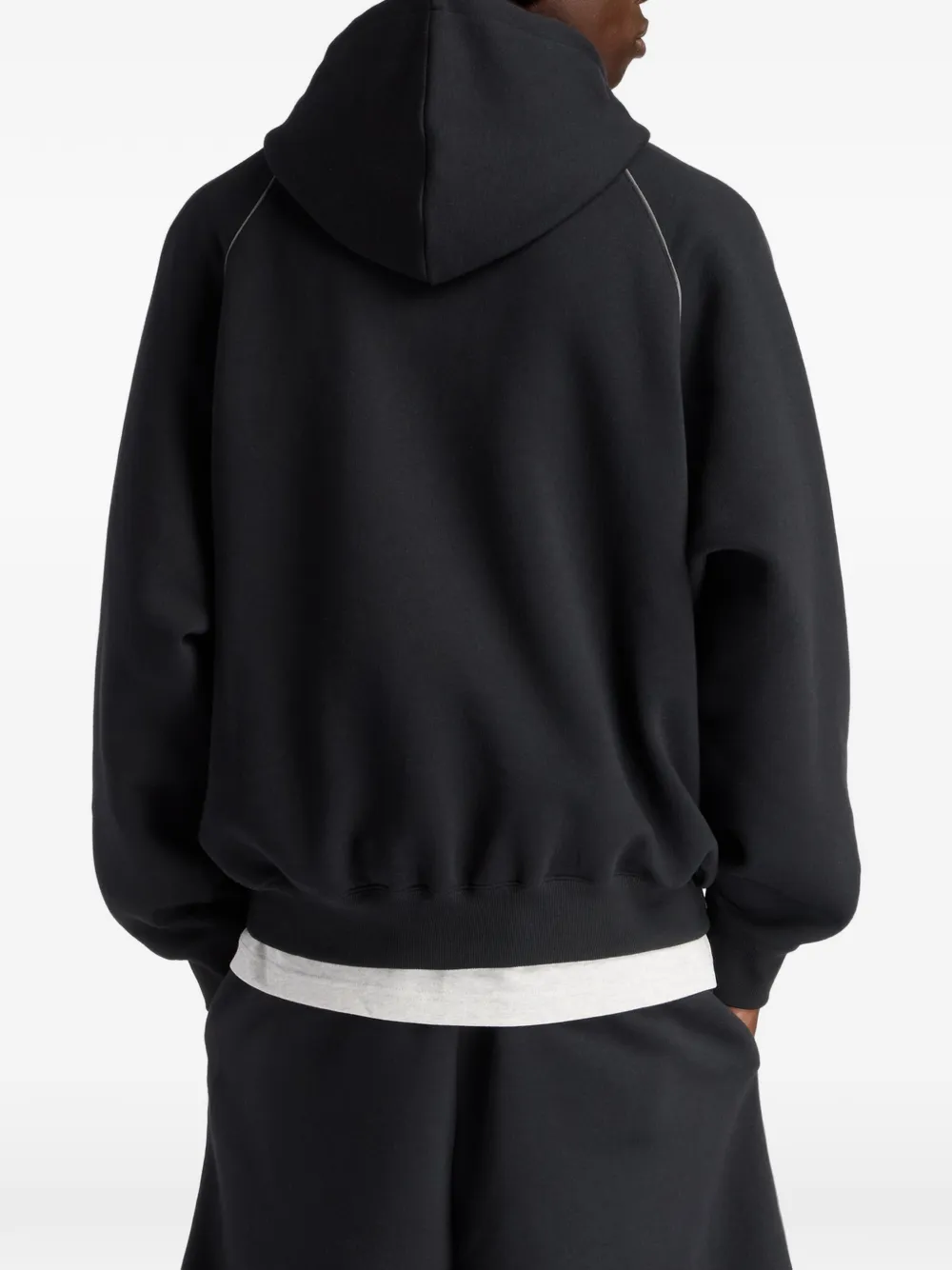 New Balance Trackside hoodie met raglan mouwen Zwart