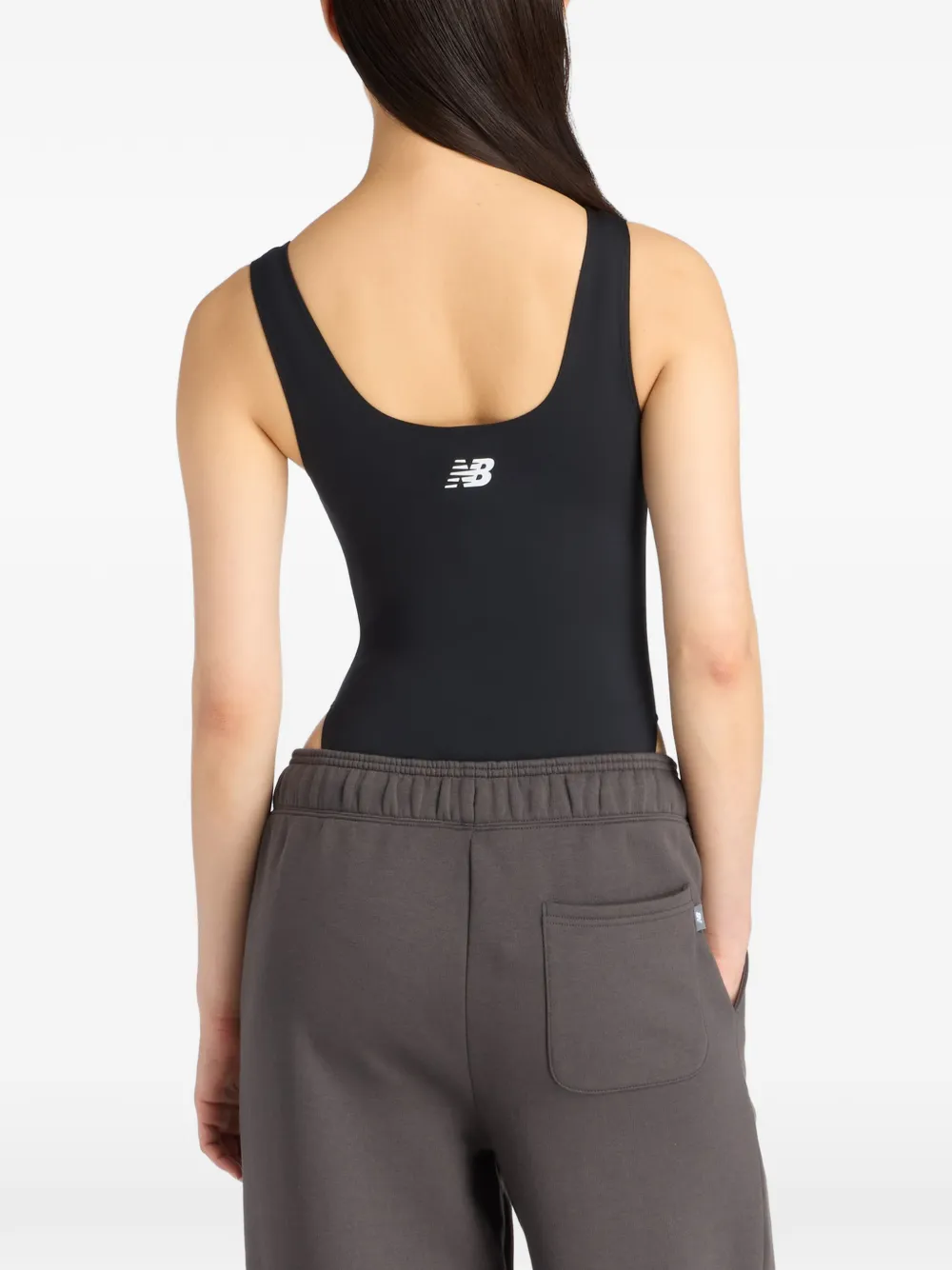 New Balance Trackside jumpsuit met logodetail Zwart