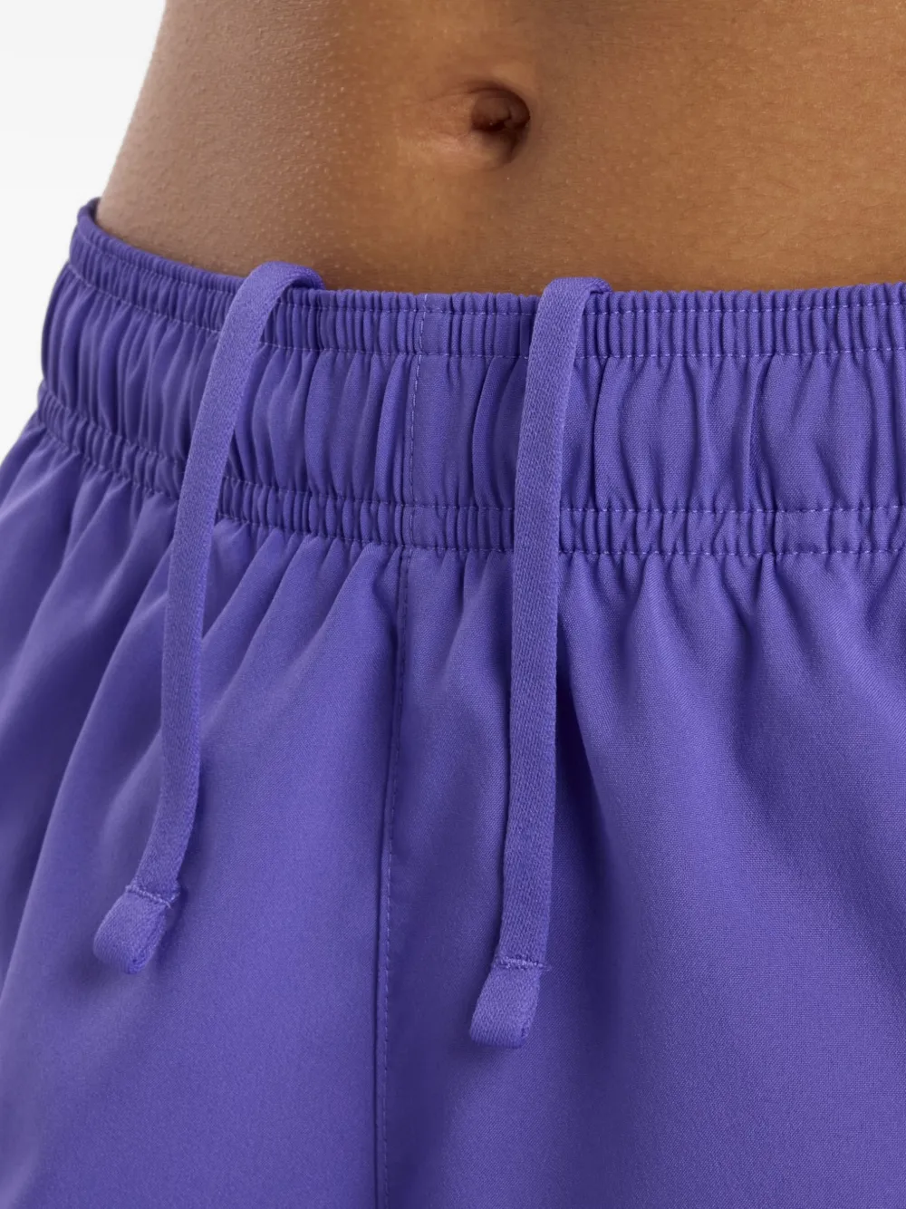 New Balance Elastische geweven shorts Paars