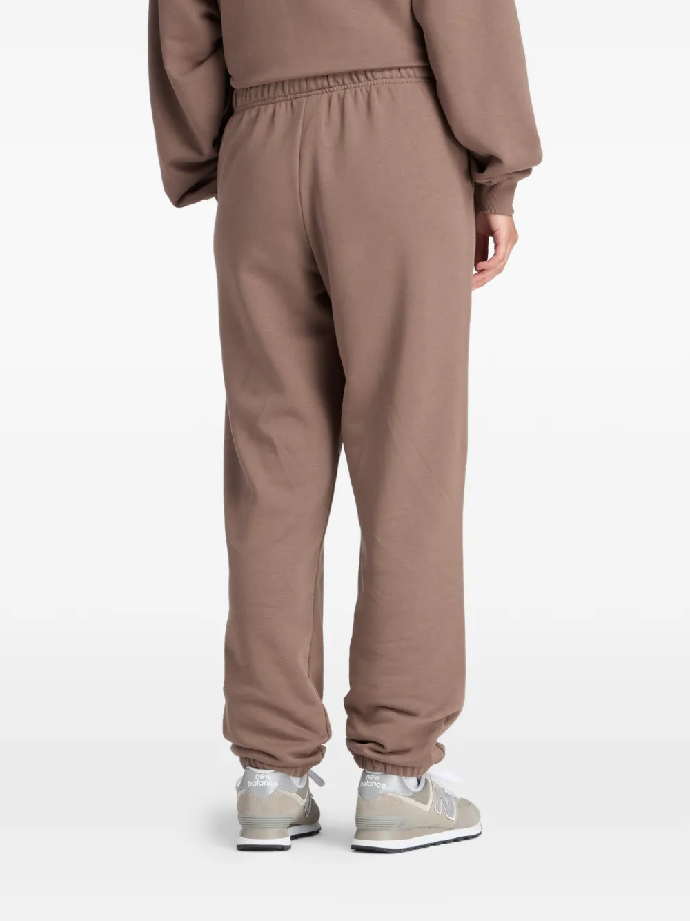 New Balance Essentials elastische trainingsbroek met logo Bruin