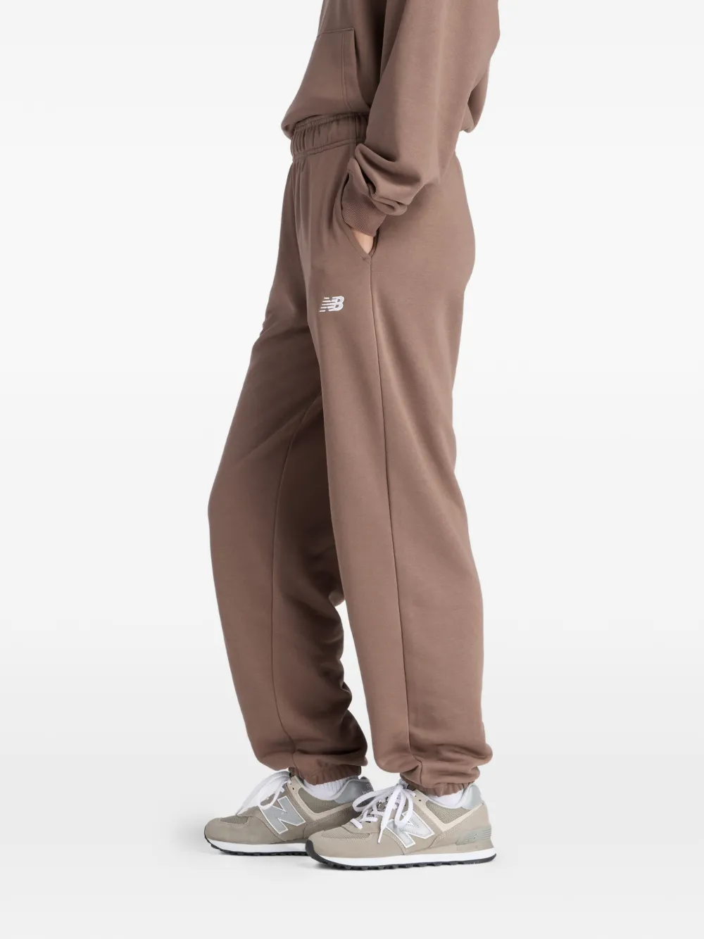 New Balance Essentials elastische trainingsbroek met logo Bruin