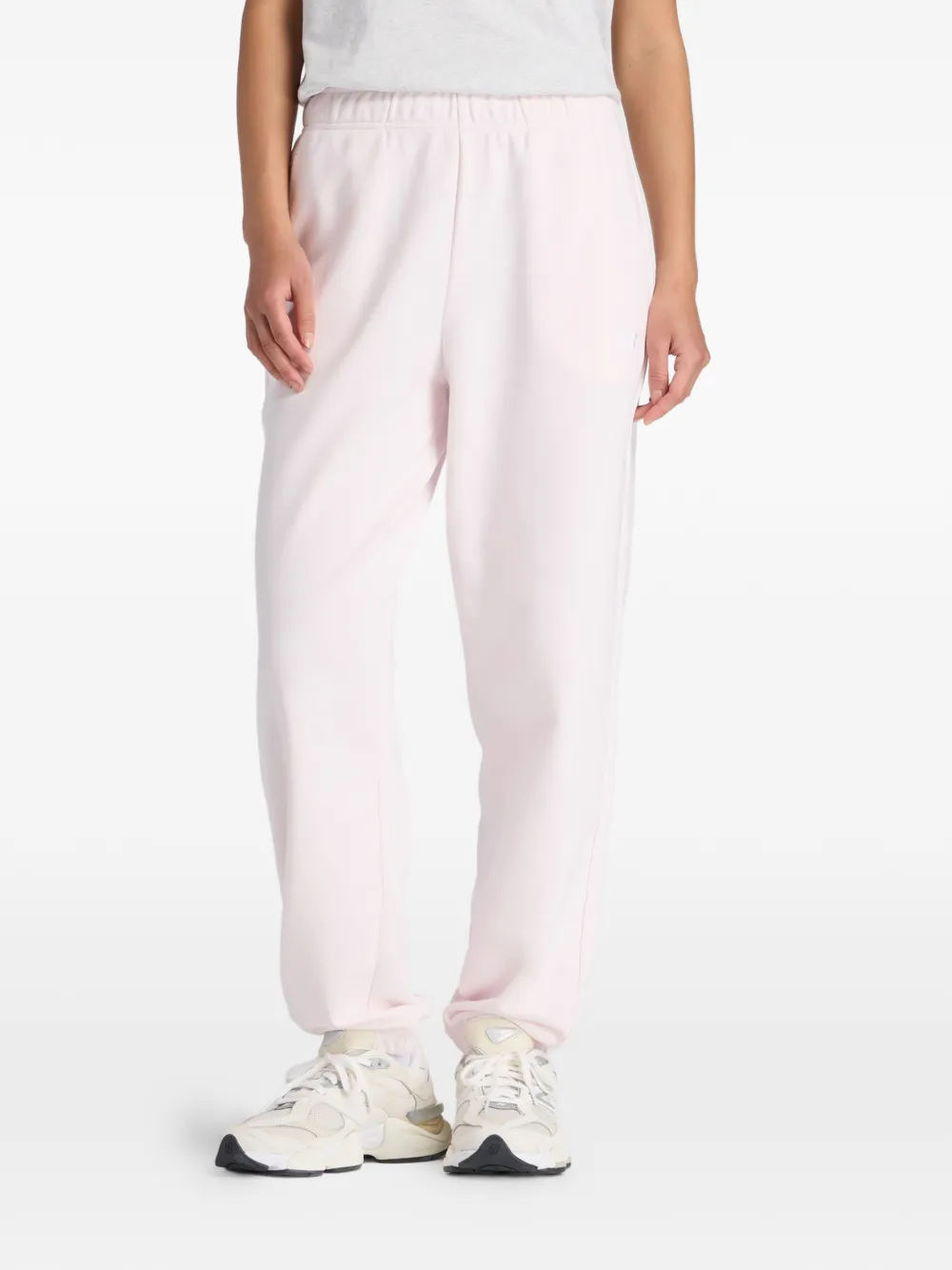 New Balance Pantaloni sportivi con logo - Rosa