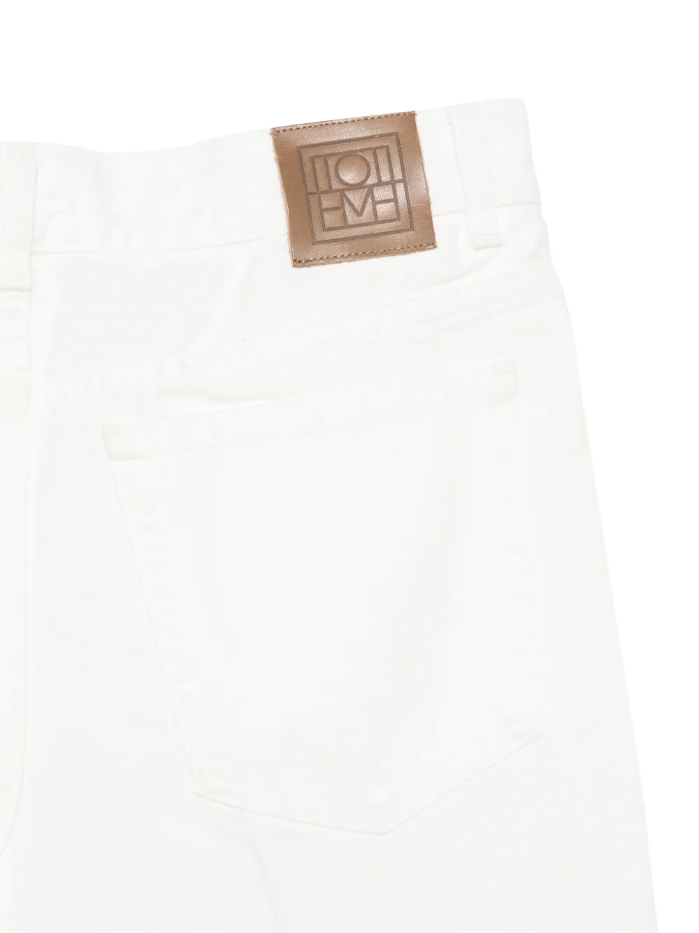 TOTEME Kick jeans met riemlussen Wit