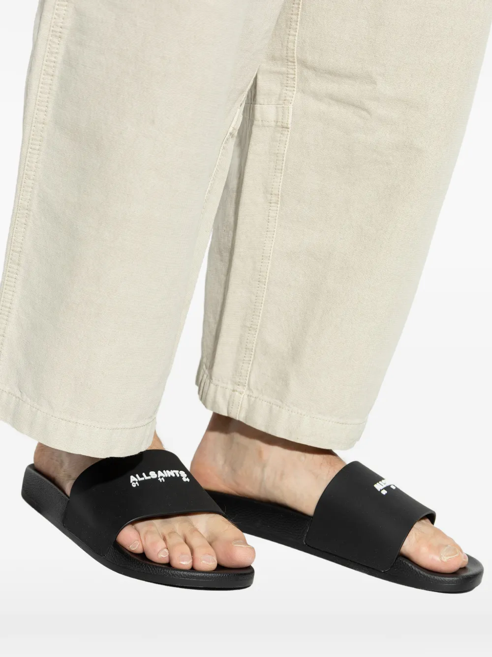 AllSaints Underground slippers met logodetail Zwart