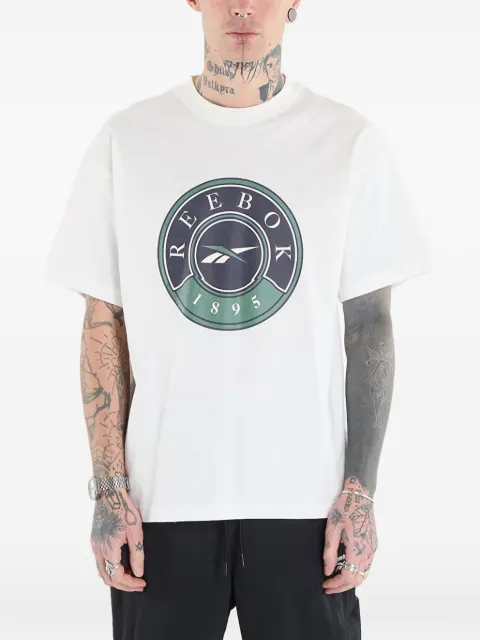 Reebok playera con estampado gráfico