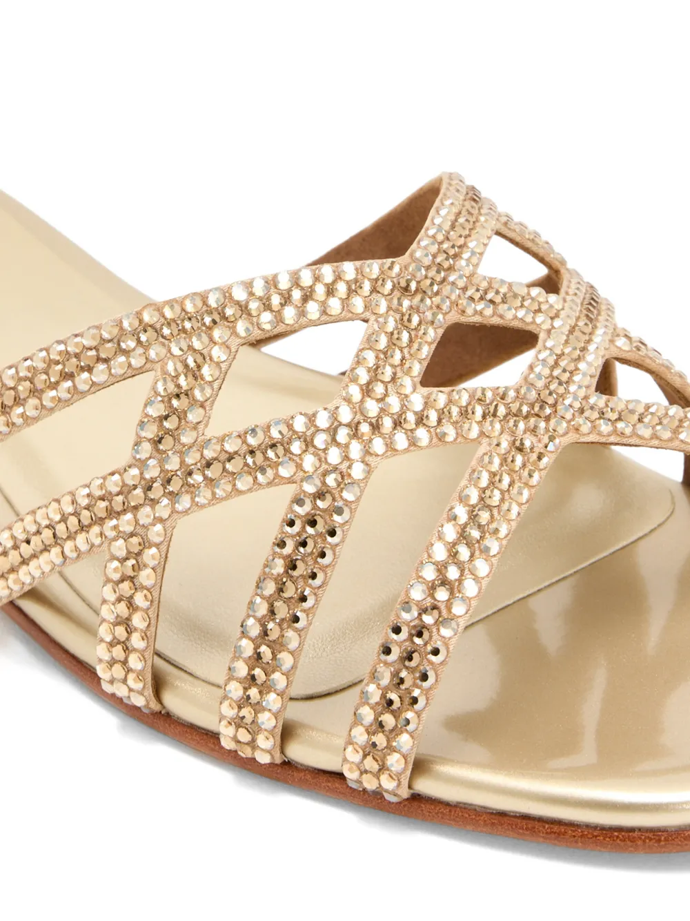 NICOLI Zuri sandalen verfraaid met gekruiste bandjes Goud