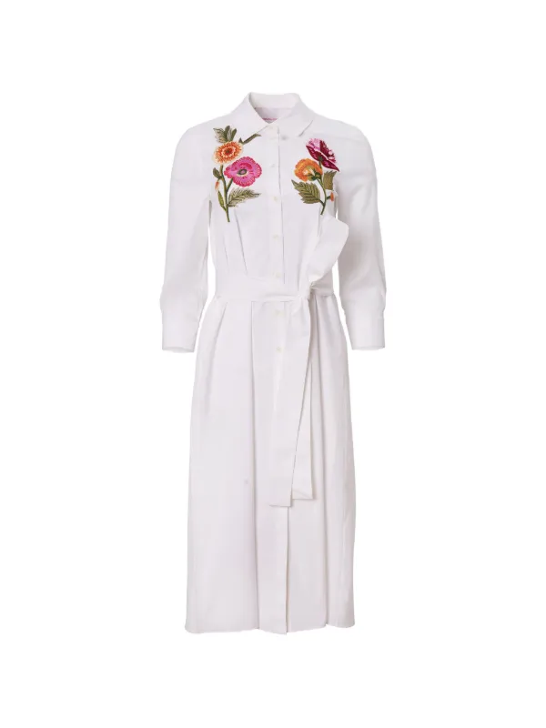 carolina herrera white shirt dress An homage to Carolina Herrera, this look features a crisp white shirt with smocked cuffs over a ball skirt with pockets. Like the iconic designer, this look blends elegance with cool effortlessly. #