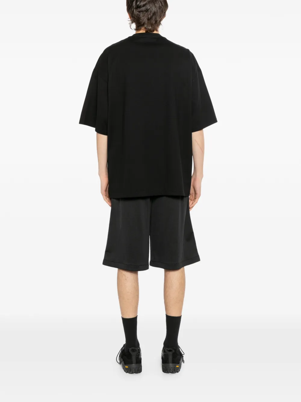 Mastermind Japan T-shirt met grafische print en zak Zwart
