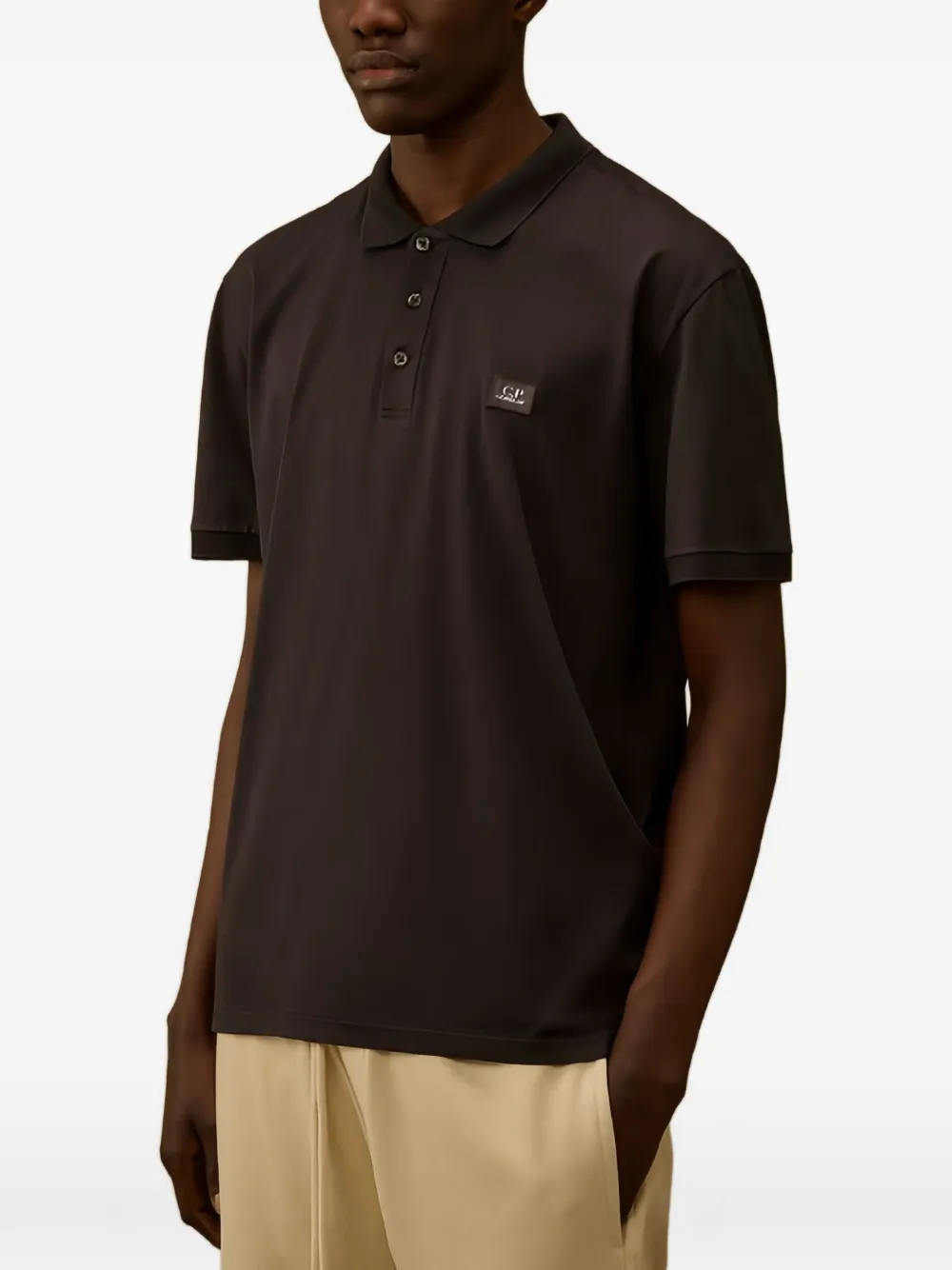 C.P. Company Poloshirt met logopatch Bruin