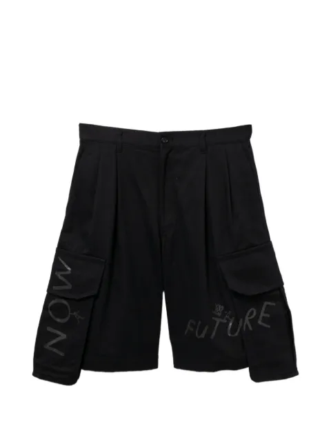 Comme Des Garçons Shirt short cargo à jambes larges à slogan imprimé