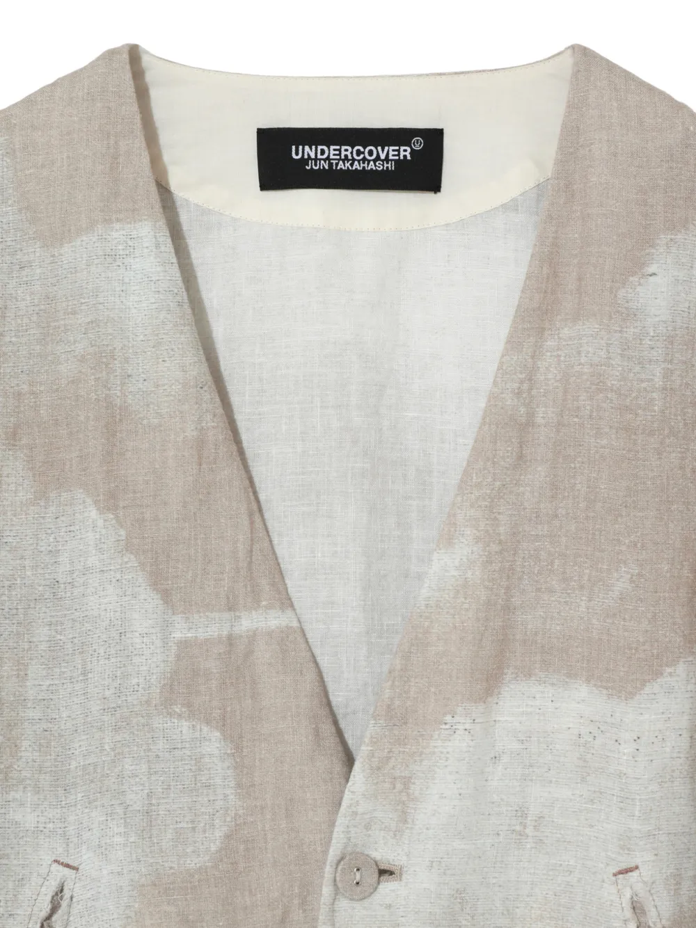 Undercover Jack met print Beige