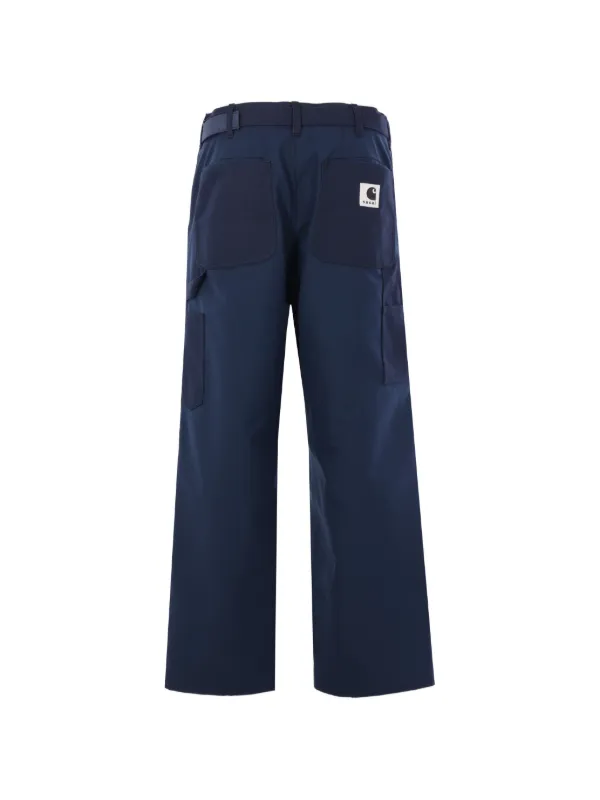 Sacai x Carhartt Wip ベルトループ パッチ パンツ | ブルー | FARFETCH JP