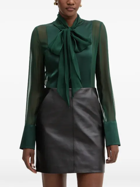 Retrofete blusa con detalle de moño