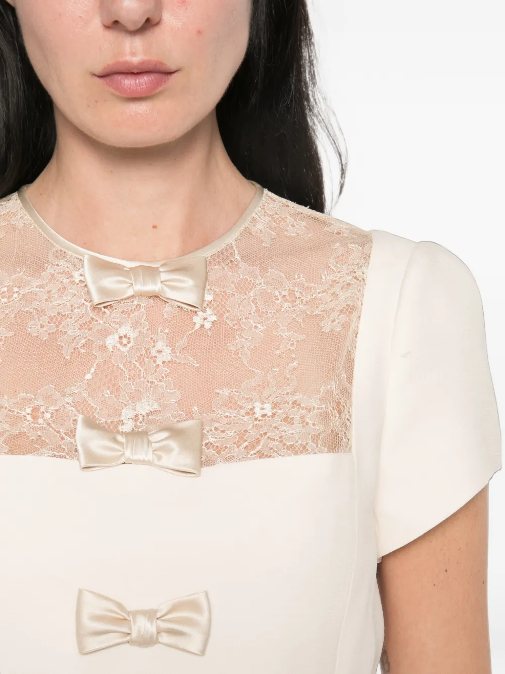 Valentino Garavani Mini-jurk met kanten vlakken en strikdetail Beige