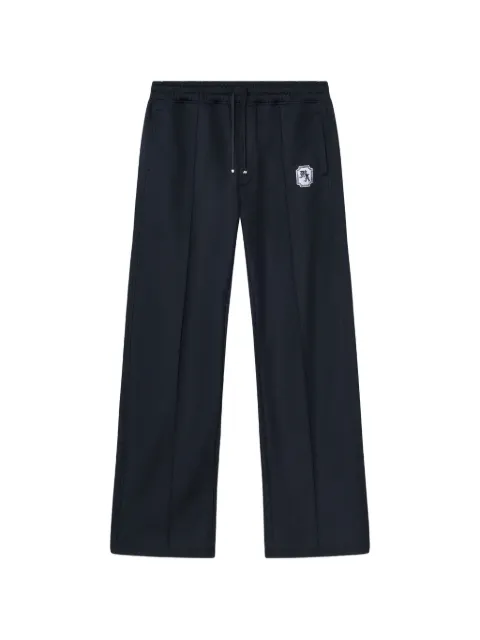 AMIRI logo-patch straight trousers