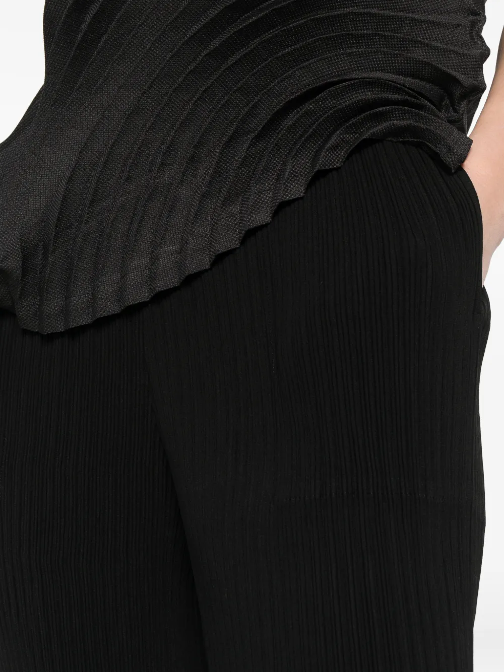 Issey Miyake Geribbelde broek Zwart