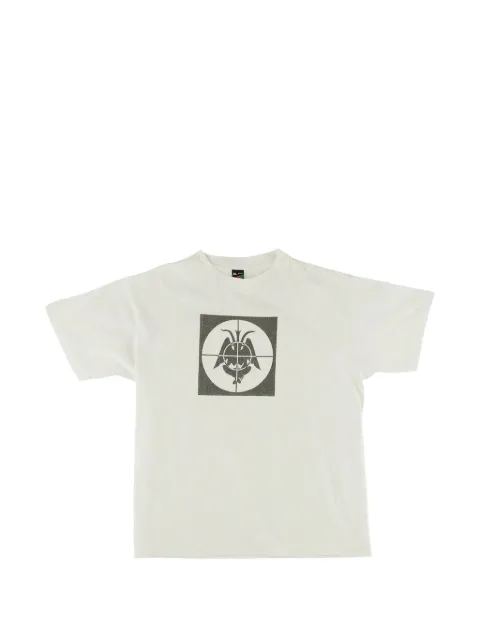 Denim Tears playera con estampado gráfico en colaboración con Saint Michael