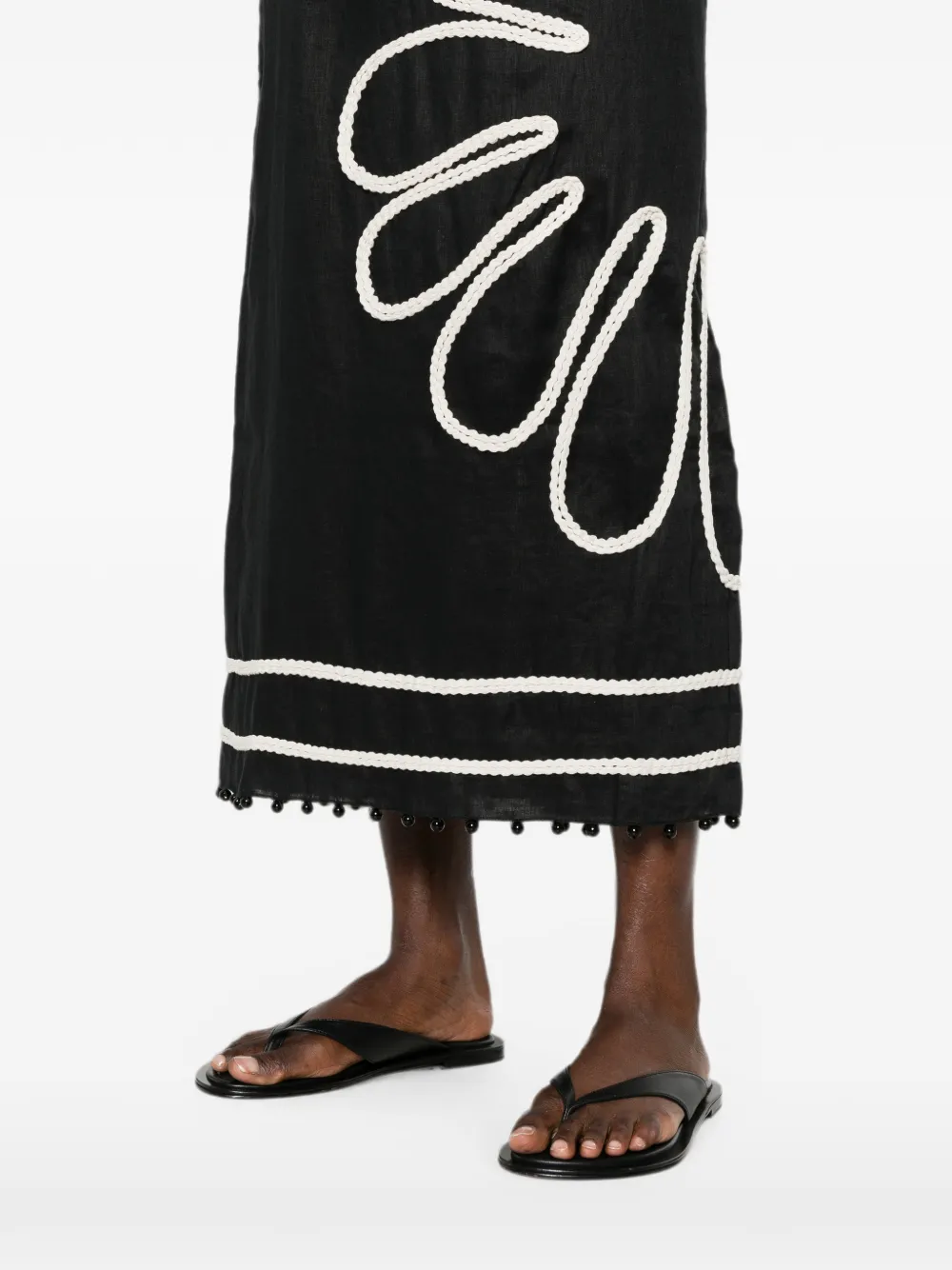 Cala de la Cruz Paloma midi-jurk met gevlochten afwerking Zwart